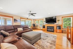 Living Area with Sunroom Access and Sound Views