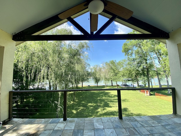 Upstairs patio off the great room with panoramic lake views!
