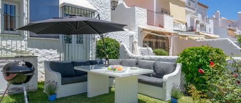 Private garden with lovely dining area, bbq and sun loungers.