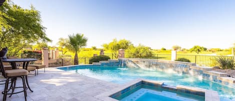 Enjoy true resort style living with this decadent backyard.
