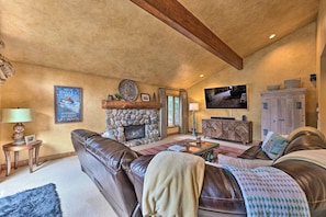 Feel right at home in front of the flat-screen TV and fireplace.