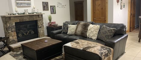 Living room with gas fireplace. 