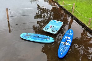 Paddle boards for 2, paddle boat for 4, and water volleyball