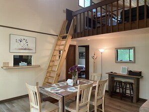 View of dining area and pass-thru to kitchen