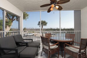 Screened lanai with outdoor dining table