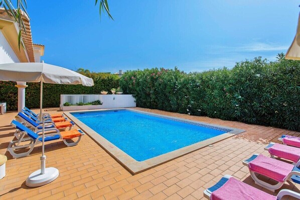 Large Crystal Clear Heated  Swimming Pool with Ample Sunbeds