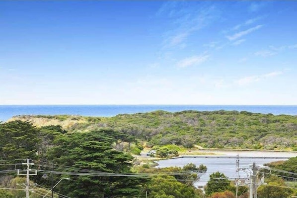 Stunning light-filled townhouse with panoramic 360° views from an amazing rooftop terrace that faces the coast, overlooking Torquay golf course, Spring Creek & vast ocean views! 