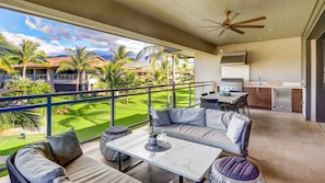 Covered 521 sq ft lanai with glass railing & walls for unobstructed views