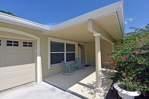 Entry way to home, 1-car garage is also included to use.