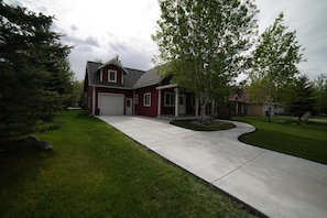 Corner lot with a single garage space and driveway so everyone has a place to park.