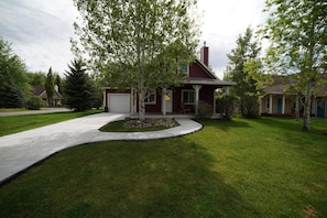 Corner lot with a single garage space and driveway so everyone has a place to park.