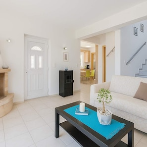 Open, airy, and sunlit — the living area is the heart of the home, perfect for gathering