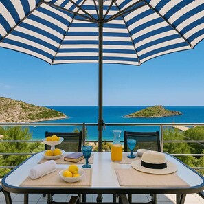 Enjoy coffee on your private balcony as the sea breeze welcomes you to another perfect day in Corfu.