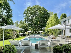 4 Sun Loungers with 2 Umbrellas