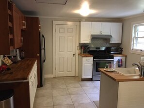 Kitchen has everything you need.  Full size fridge, range and toaster oven.  