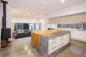 Main open Kitchen and Living area.. stacking doors to alfresco
