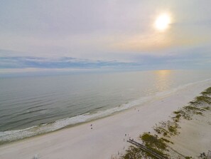 A Sunset Stroll In The Soft Sand