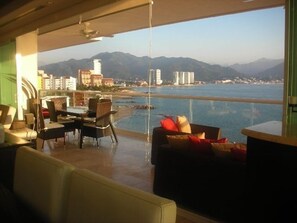 Looking out to balcony and views from Living Room.