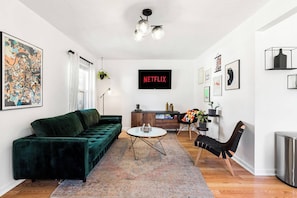 Walk into our bright, modern design living room. Relax in this style prior to heading out to Tootsie's Orchid Lounge downtown (only 2.2 Miles away).
