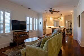 Open floor plan with TV and cozy furnishings