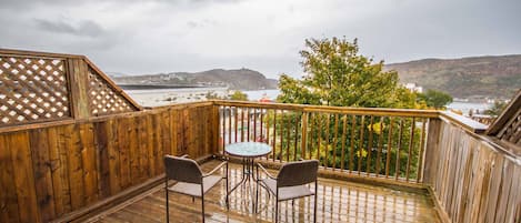 View Signal Hill, the narrows, the ocean, and the city from your private patio.