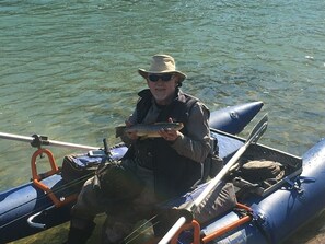 Randy with a 17” brown from right off the landing at the house