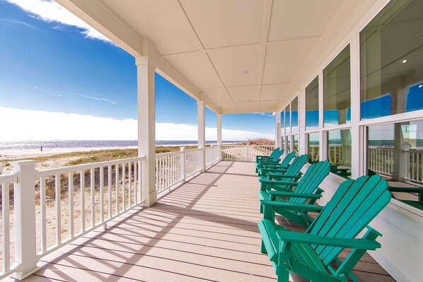 Covered deck looking out over the beach. Great sitting area.