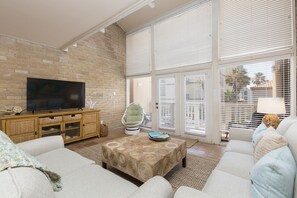 Spacious Living Area with direct patio access!