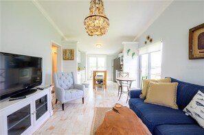 Coastal casual living room - look straight through the kitchen to the river!