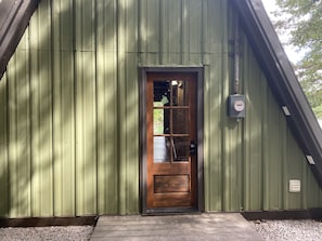 The front door.  You can literally park at the front door.