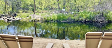 River flows on either side of the island in the backyard (seasonal on one side).