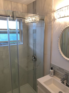 Updated full bathroom with toiletries 