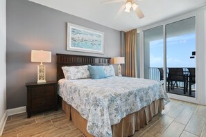 Master bedroom with King size bed and entrance to the balcony
