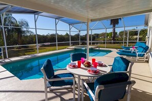 Pool area with functioning hot tub 