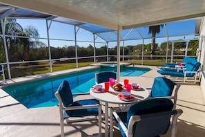 Pool area with functioning hot tub