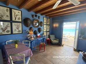 The living room of the Rental Property with view to the sea.