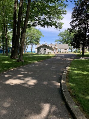 DRIVEWAY W/PLENTY OF PARKING. LAKE HURON WATERFRONT HOME