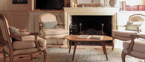 Living room with old fireplace