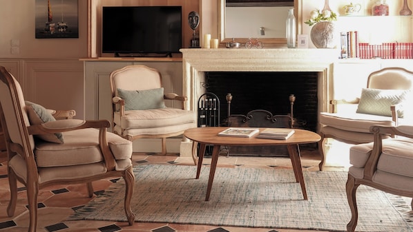 Living room with old fireplace