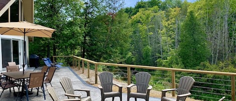 Spectacular patio & firepit overlooking the Betsie River. 