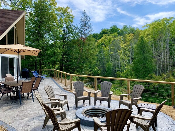 Spectacular patio & firepit overlooking the Betsie River. 