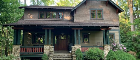 Lovely Arts and Crafts style home in a wooded setting. 