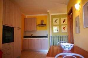 Principina mare -Apartment Bruno-The living room with open kitchen