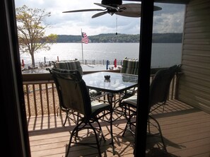 Outside seating for four and gas grill on balcony