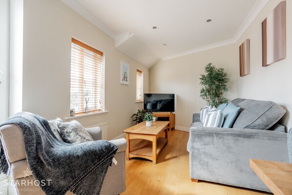 The lounge benefits from a large smart TV