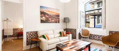 Beautiful living room with direct access to main bedroom and also dining area.