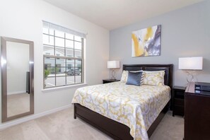 Downstairs Bedroom w QueenSize Bed and TV