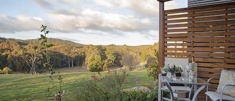 Relax and enjoy the sweeping view from your private verandah