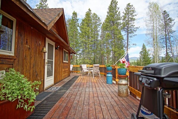 Gas Grill and flowers on the wrap around Deck