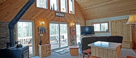 Wood-burning stove with plentiful natural light